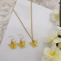 گردنبند و گوشواره پروانه ای زرد