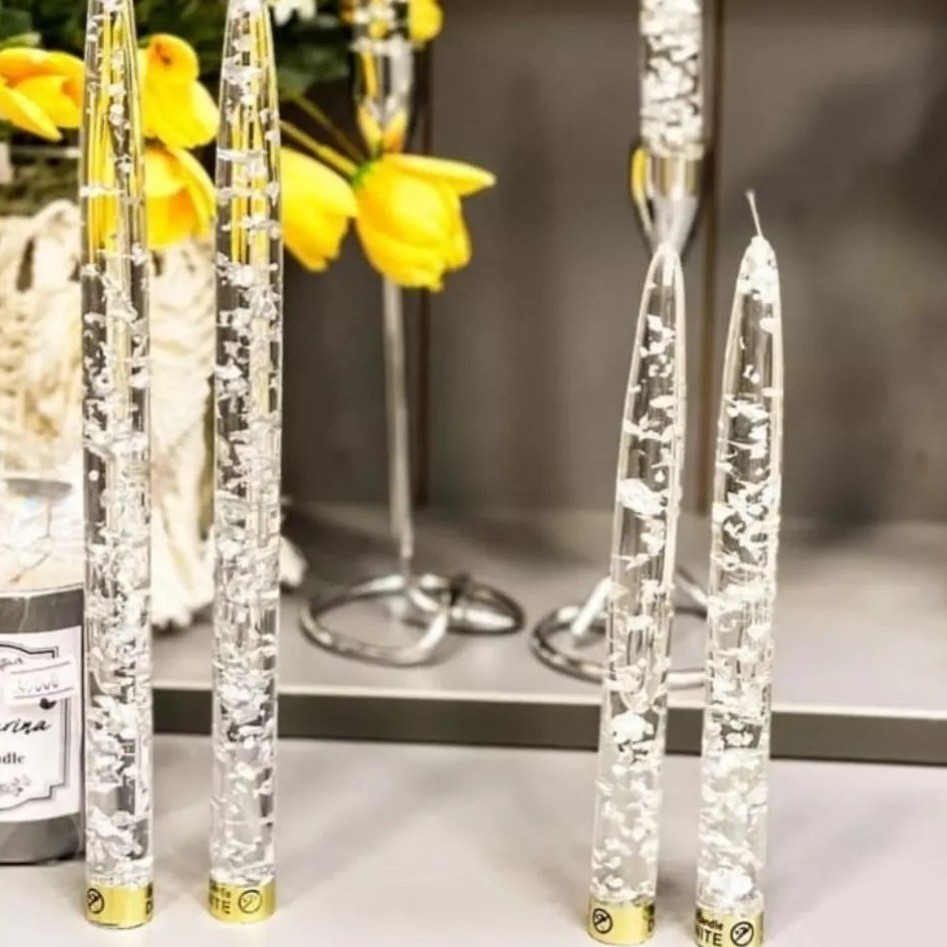 شمع کریستال رنگ نقره ای ارتفاع 20سانت قیمت هرعددشمع شاین نسوز جنس رزین اپوکسی قطر1.7  باپولک نقره وطلا جنبه دکوری دارد