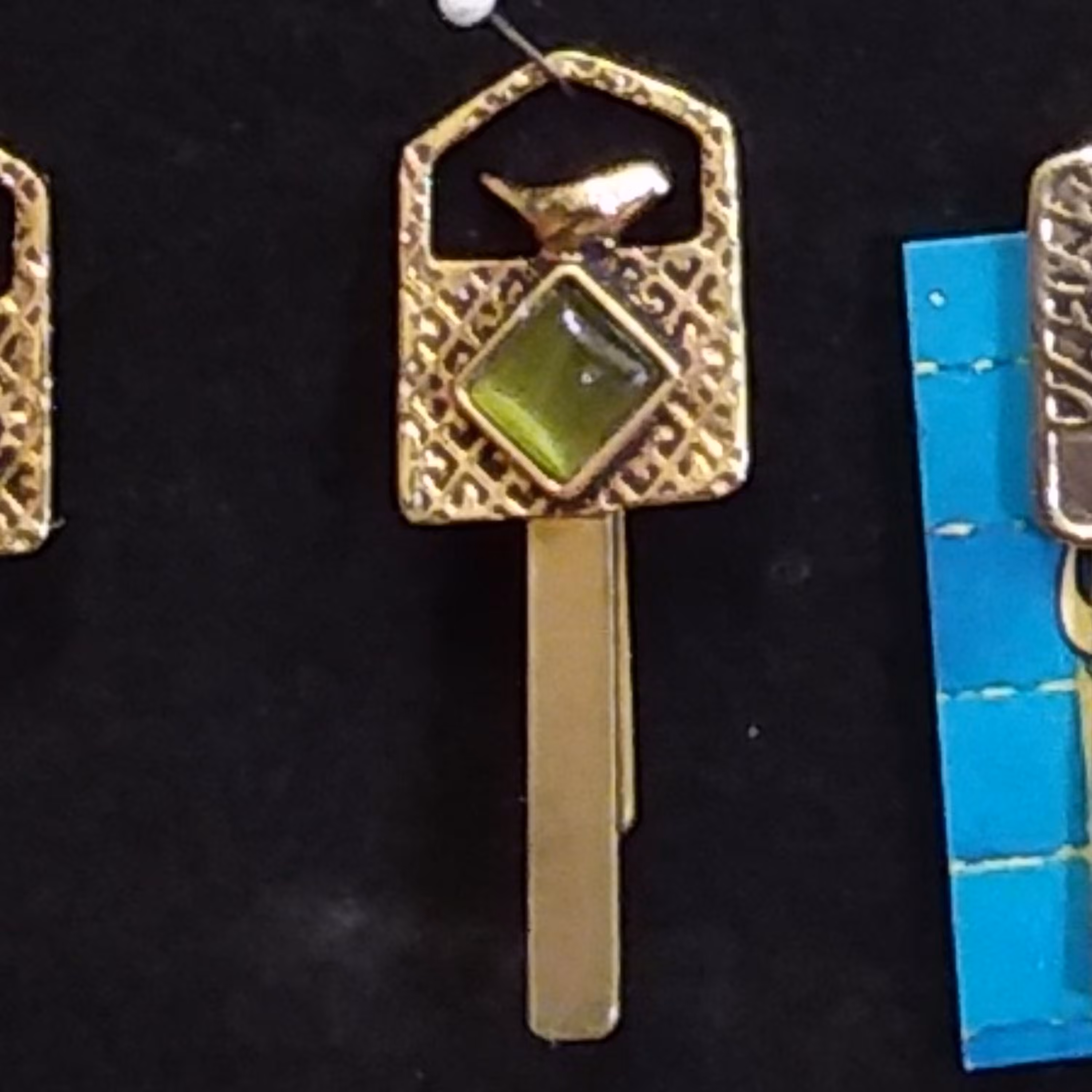 نشان کتاب برنجی پرنده