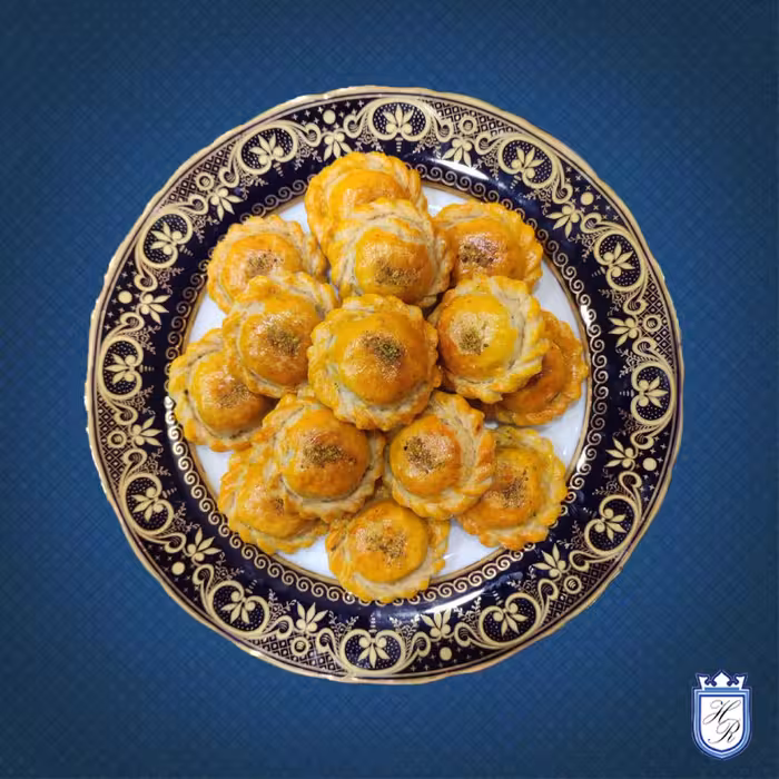 شیرینی کلوچه خرمایی مخصوص  کره ای  گردویی  دستپیچ  یک کیلو  تقریبا 30 عدد  ارگانیک  ماندگاری بالا