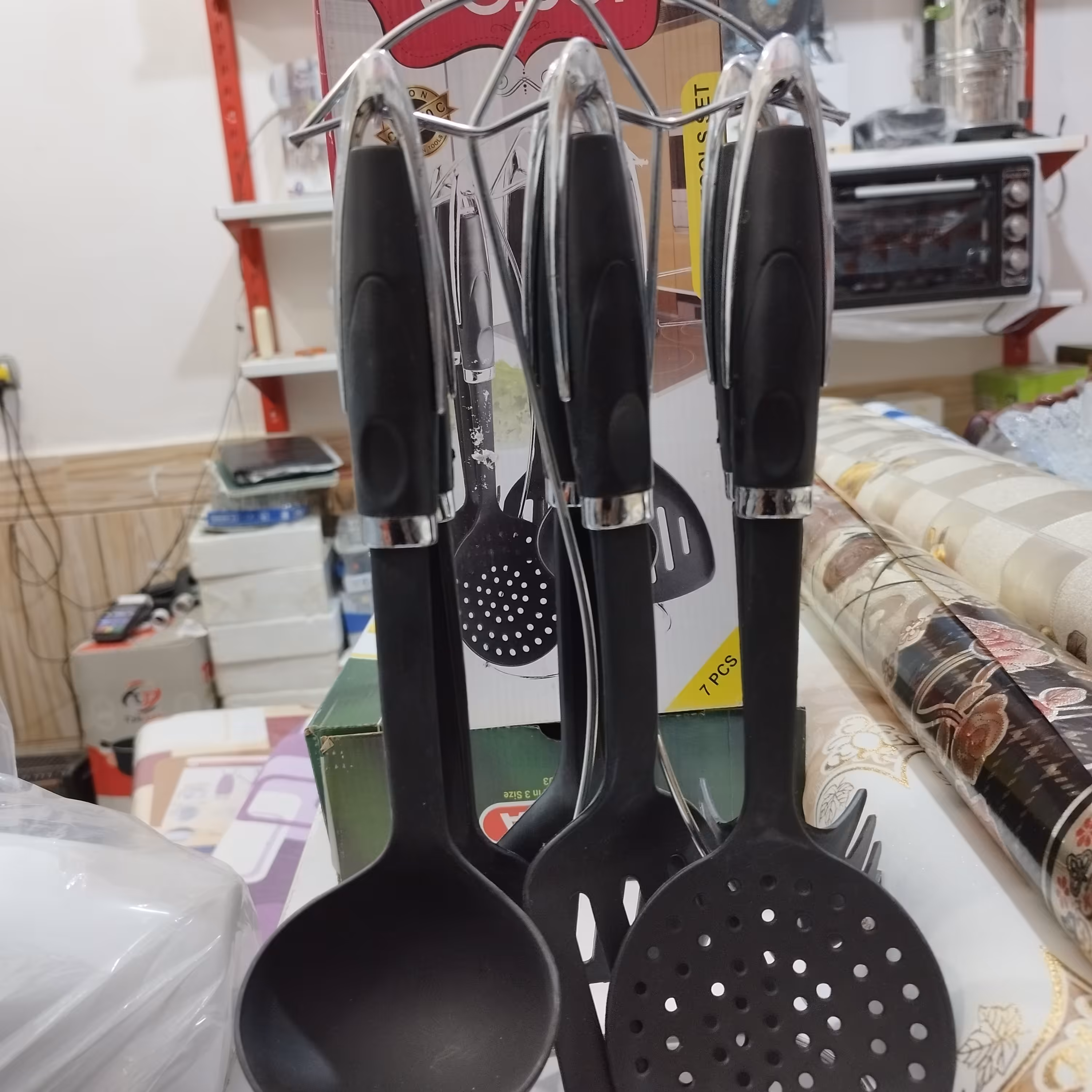 ست کفکیر ملاقه همراه استند استیل 7 پارچه درجه حرارت بالا