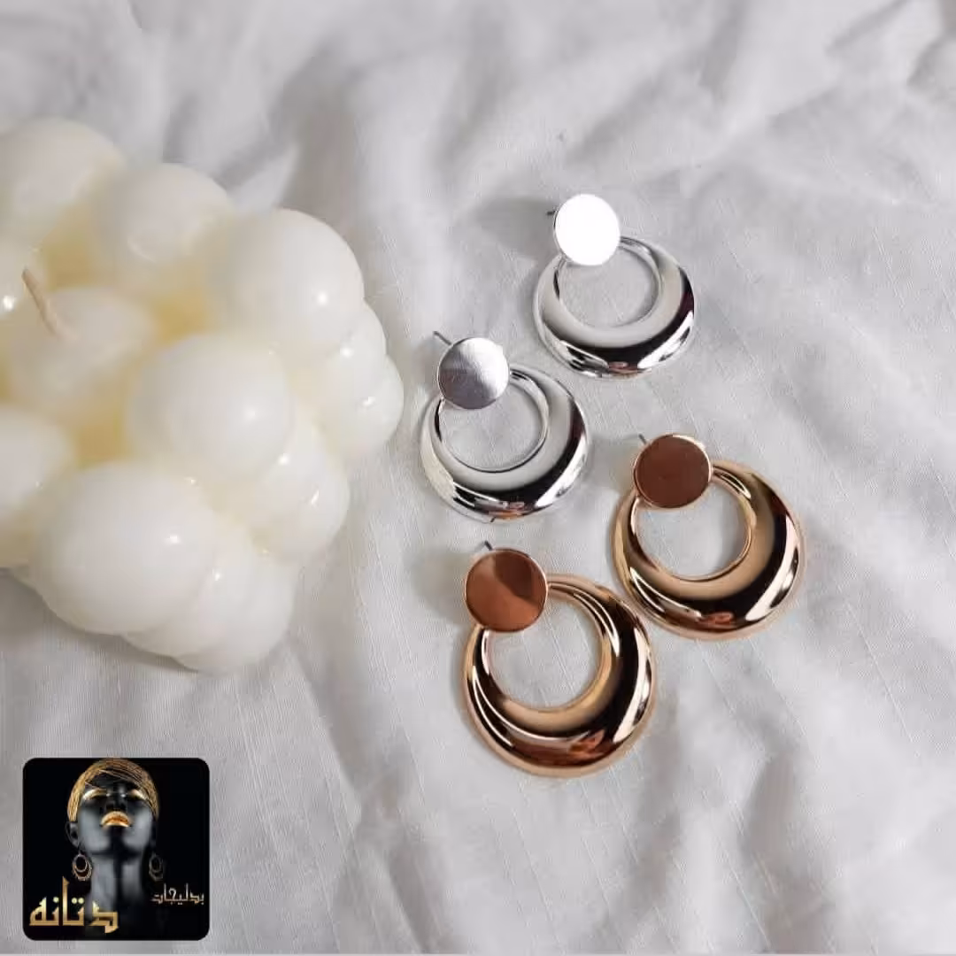 گوشواره میخی برند iam کشور سازنده آمریکا در دو رنگ مختلف طلایی و نقره ای 