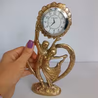 ساعت رو میزی مدل عروس داماد رقاص(برنز)