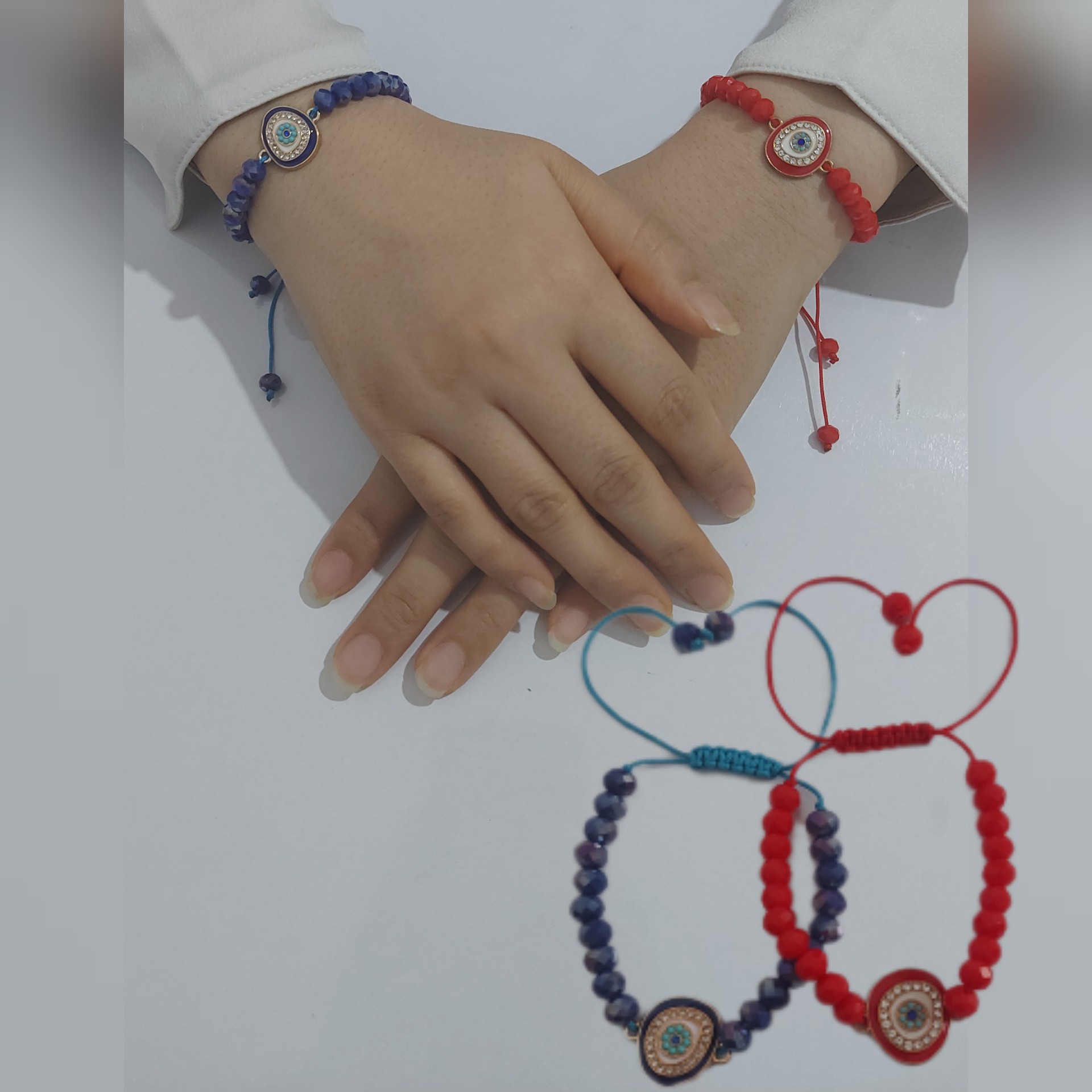 دستبند گره کشویی کریستالی با پلاک چشم زخم