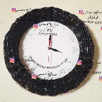 ساعت دیواری از جنس چوب ارغوان یا همون ساعت حصیری دارای موتورارام گرد