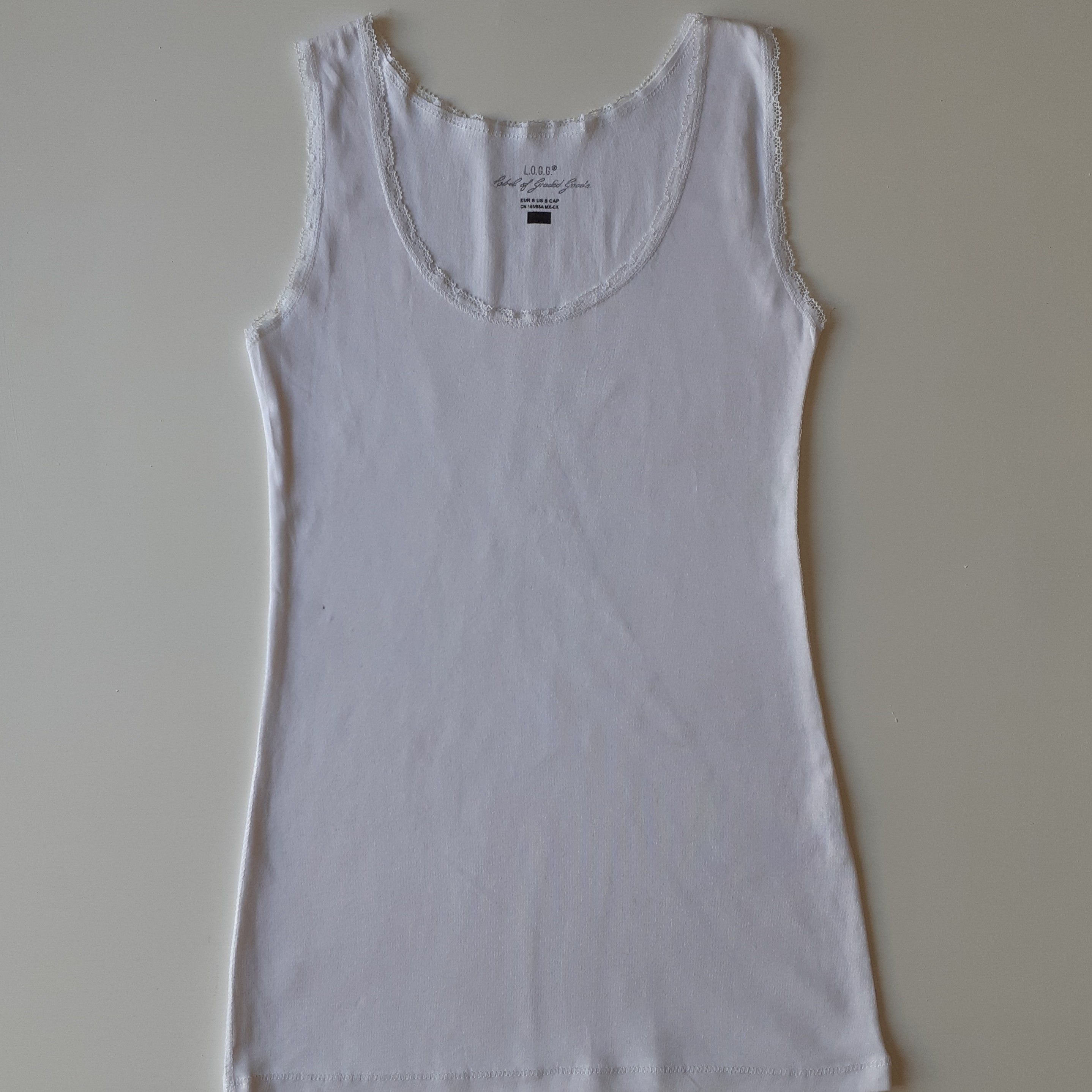 تاپ زنانه جنس نخ پنبه رنگ سفید