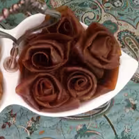 لواشک  الو طلایی  و سیب گلاب  هیلدا  200 گرمی  خوش عطر  و خوش مزه ترش و شیرین