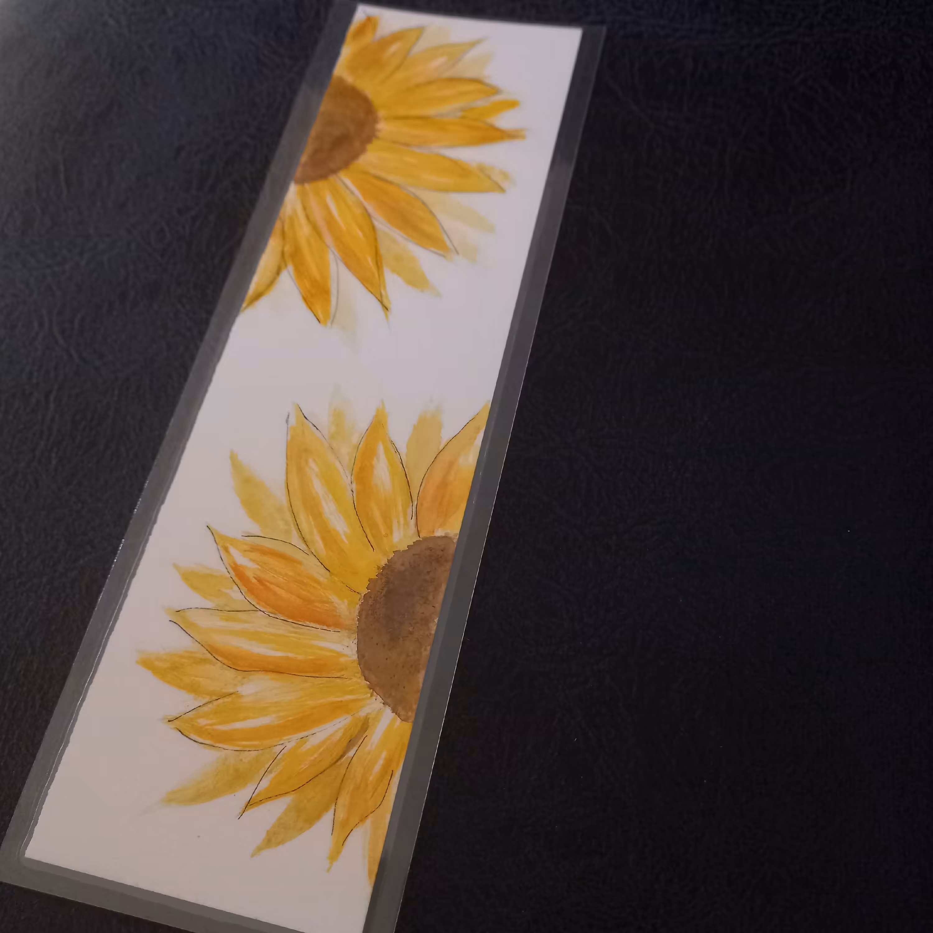 نشانگر کتاب نقاشی شده روی مقوا و لمینت شده طرح گل افتابگردان