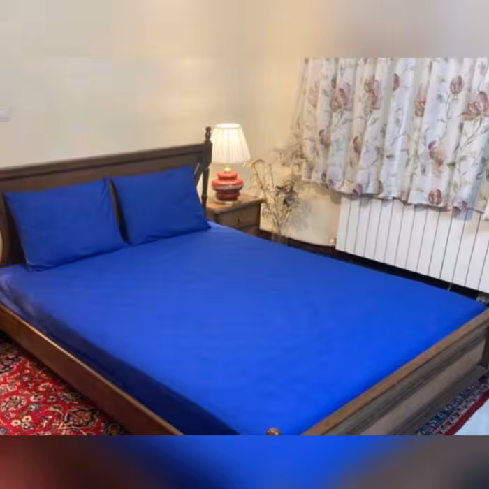 روتختی کش دار  دونفره به همراه دوعدد رو بالشی زیپ دار