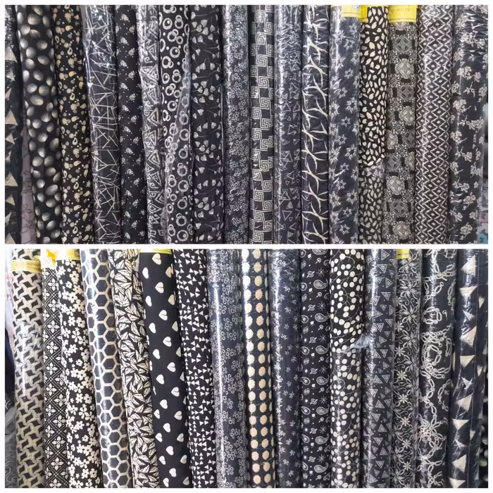 پارچه کرپ حریر طرح دار زمینه مشکی