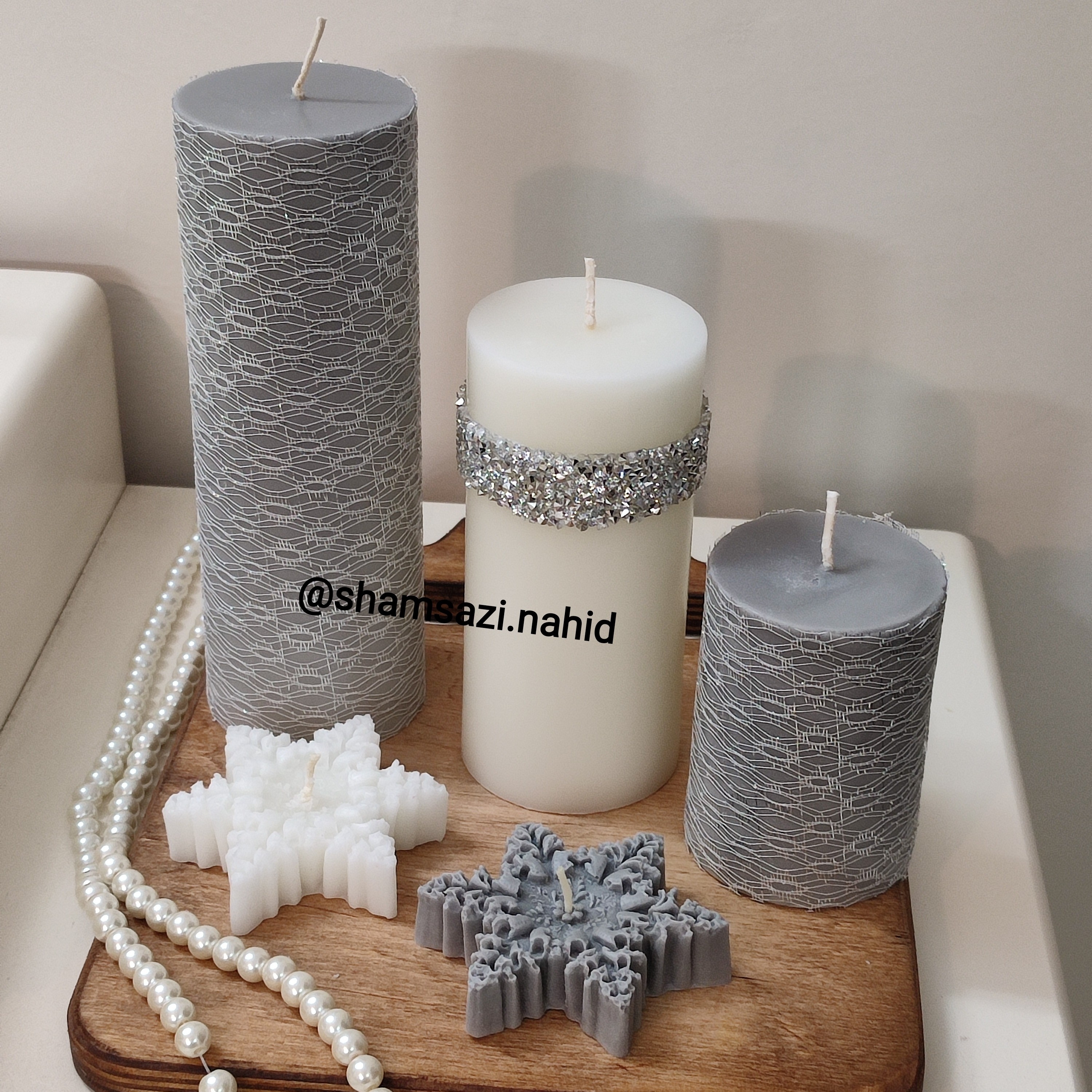 شمع 4عددی ست  طوسی سفید(استوانه وگل وروبیک وستاره) 