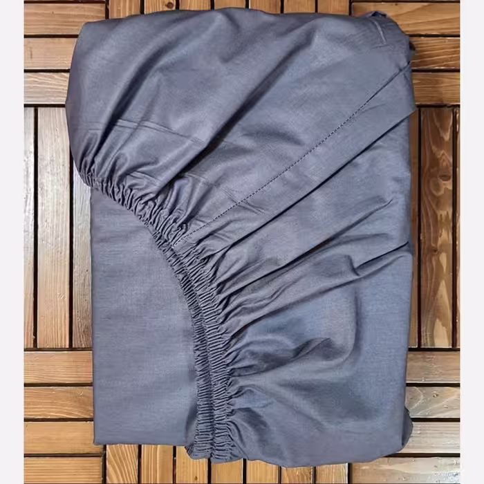ملحفه کش دار دونفره  طوسی درجه یک پارچه براش ( ضمانت پرز ورنگ )