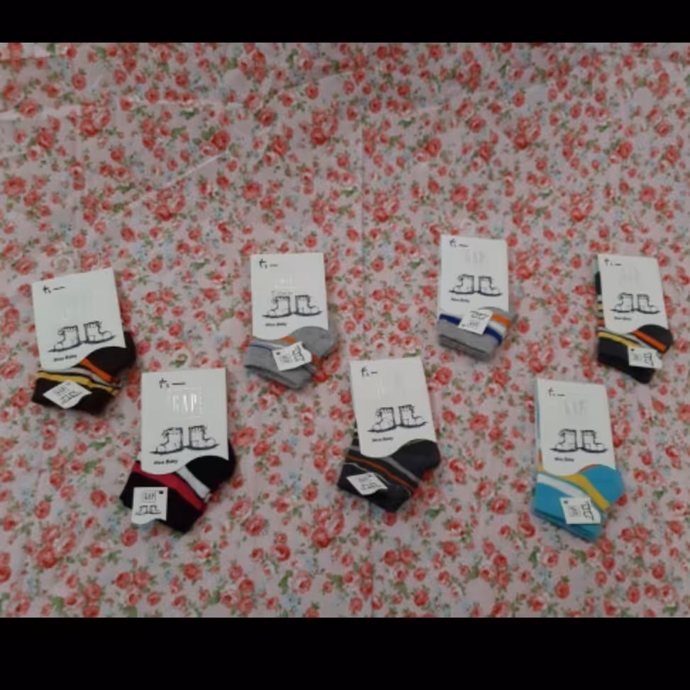 جوراب نوزادی نخی کیفیت فوق العاده عالی طرح راه راه رنگبندی متفاوت