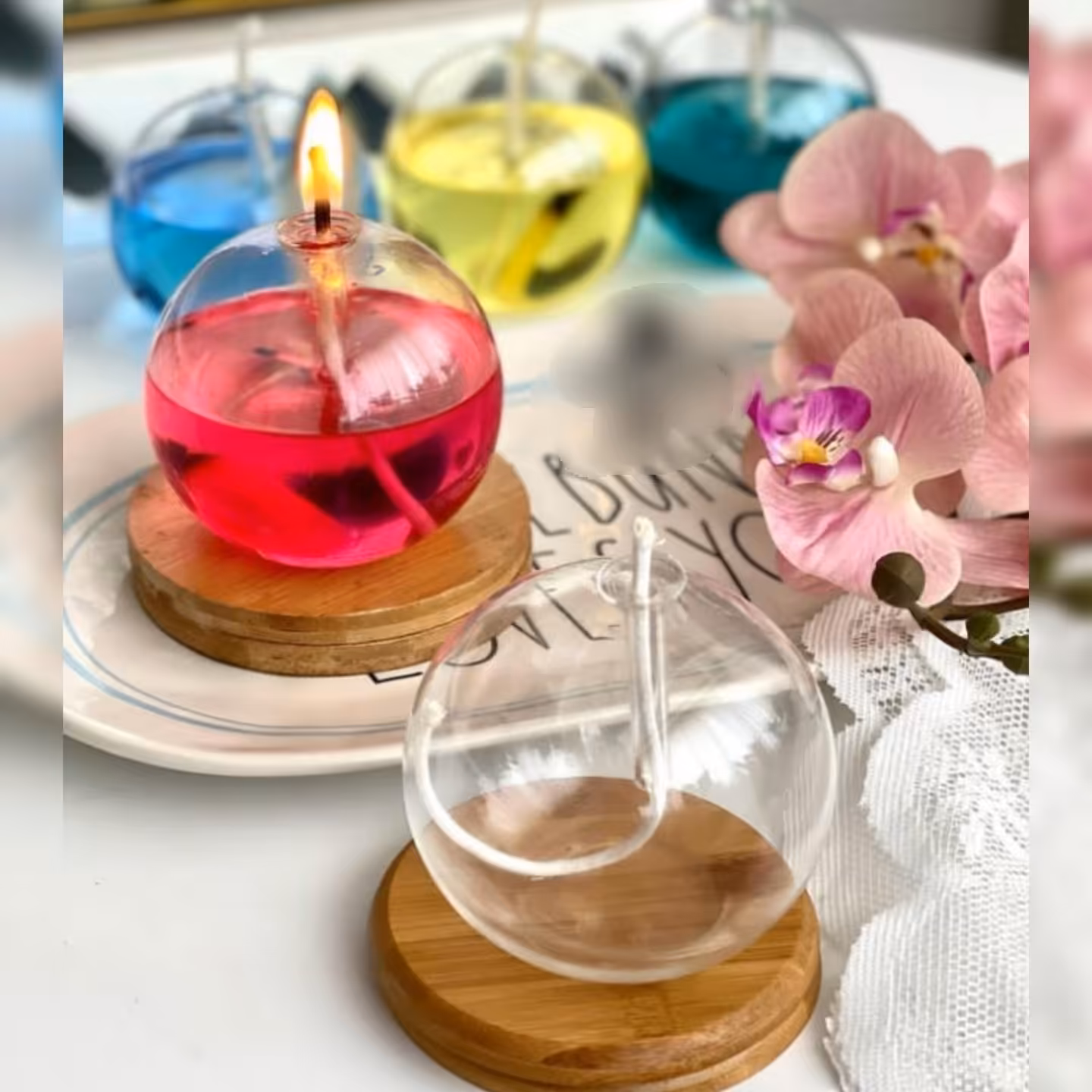 جا شمعی پیرکس گرد همراه با پارافین مایع سایز کوچک رنگ پارافین رندوم