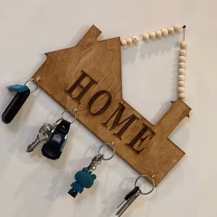 جاکلیدی چوبی دیواری طرح خانه آویز مهره ای