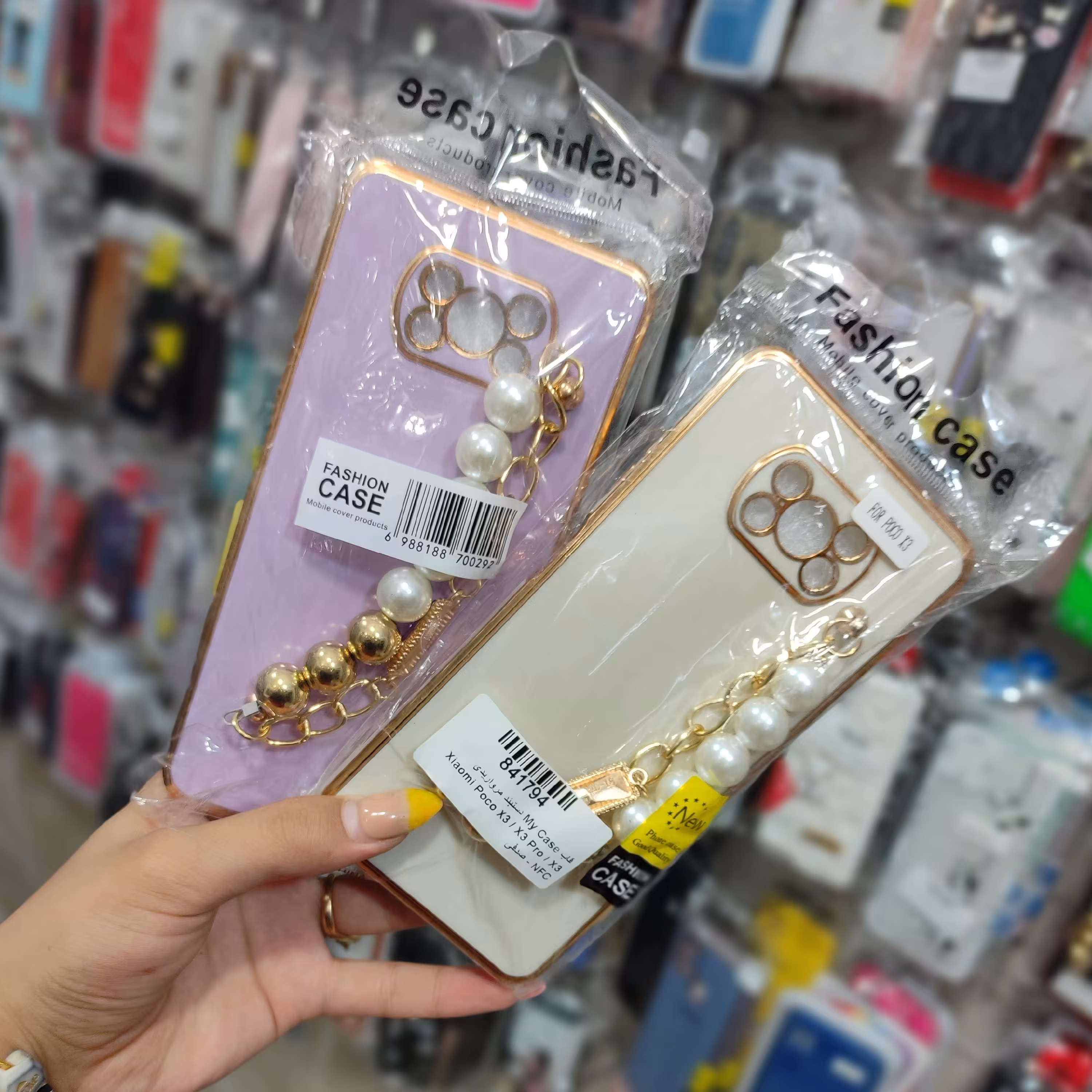 قاب گوشیpocox3proقاب گوشی دستبند فانتزی مرواریدی موجود ب تمامی گوشی ها