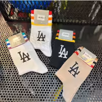 جوراب ساق بلند خط رنگی LA درسه رنگ مشکی،سفیدونسکافه ای  بهترین برند موجود درایران کاراکواسپرت