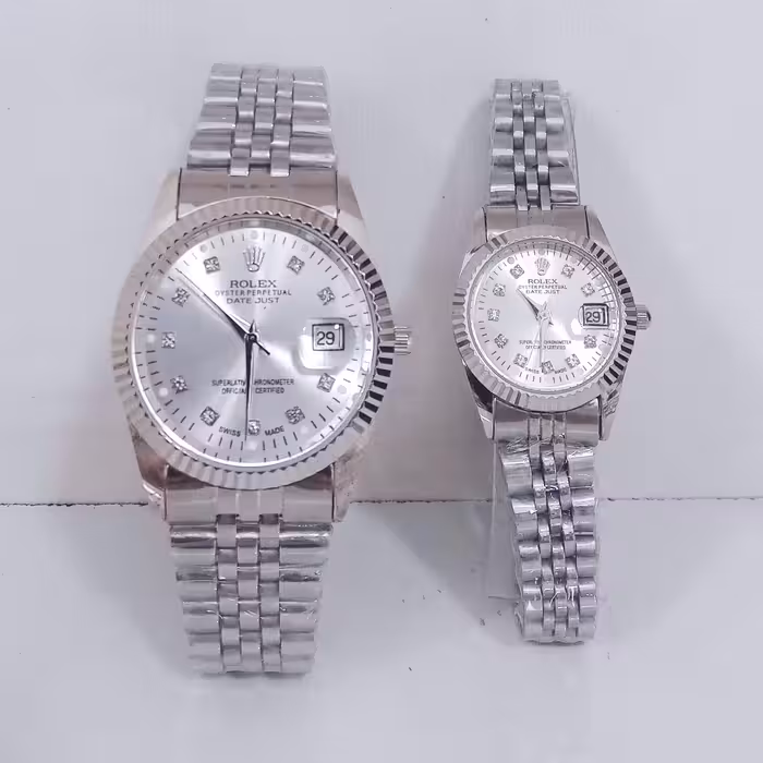 ساعت رولکس ست زنانه و مردانه نقره ای تقویم دار رنگ ثابت استیل ضدآب ارسال رایگان همراه با جعبه رایگان 