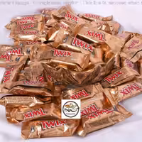 شکلات توویکس مزه کارامل و شکلات 1000 گرمی خالص