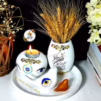 ظروف سفالی 5تیکه چشم نظر شامل جای گلدون وجای شمع وارمروگنجشک متوسط و گنجشک کوچک وسینی 