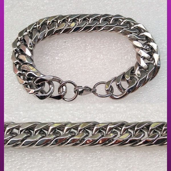 دستبند کارتیه مکعبی دور نرم نقره ای استیل