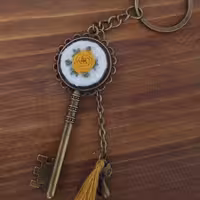 جاکلیدی طرح کلید برنزی گلدوزی عسلی منگوله عسلی 