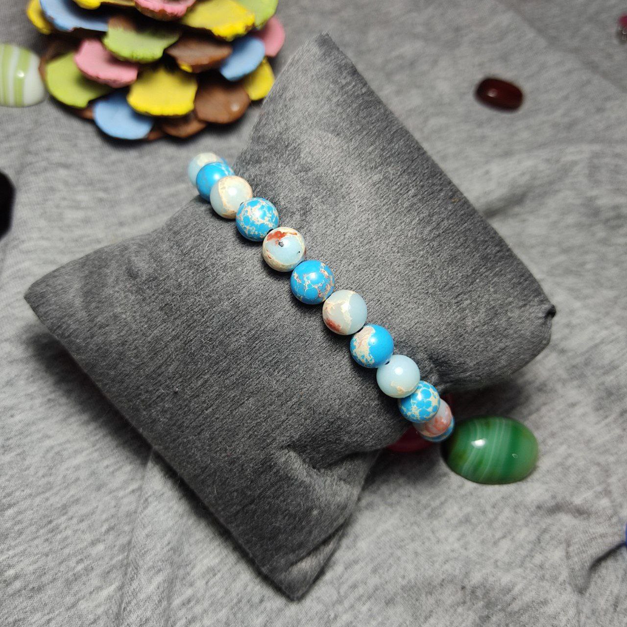  دستبند فوق العاده زیبا با مهره های سنگ  فیروزه اقیانوسی
کد 28232