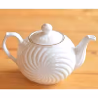 قوری خورشیدی زرین