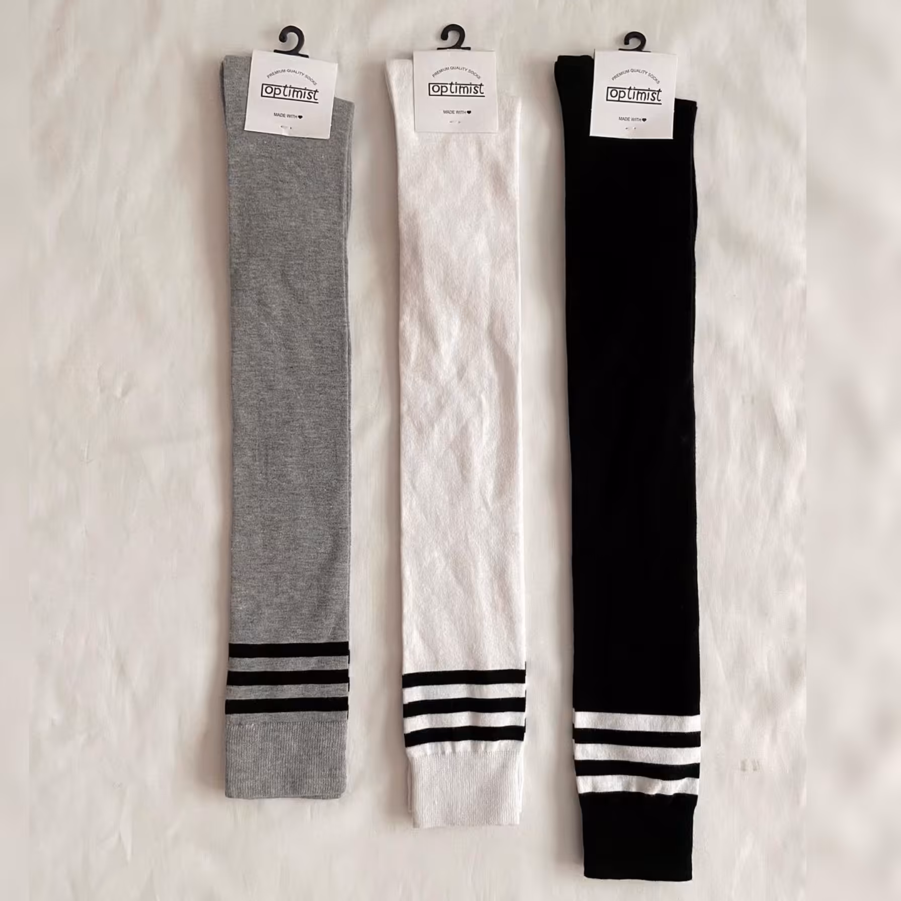 پک 3 تایی جوراب طرح 3خط ساق بلند بالازانو فری سایز