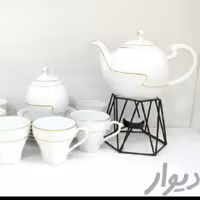 سرویس چایی خوری دو خط طلا قوری مقصود قندان مقصود چایی خوری مقصود