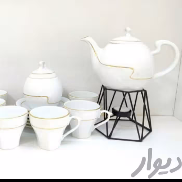 سرویس چایی خوری دو خط طلا قوری مقصود قندان مقصود چایی خوری مقصود