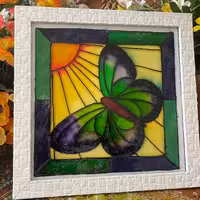 تابلو ویترای پروانه و خورشید