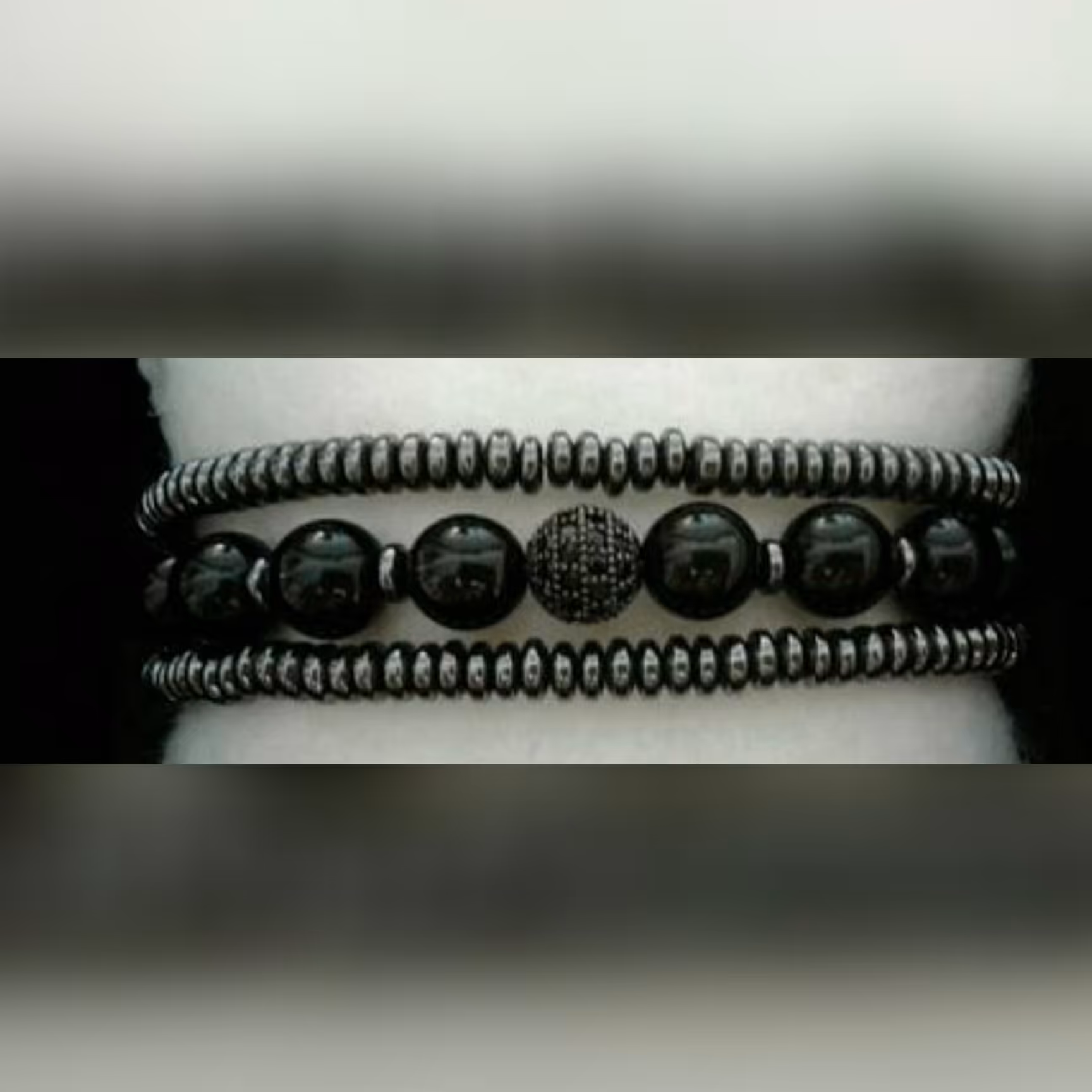 دستبند سه ردیفه سنگ انیکس مشکی و حدید واشری دودی