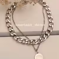 دستبند دو ردیفه ی نقره ای کارتیر با آویز سکه