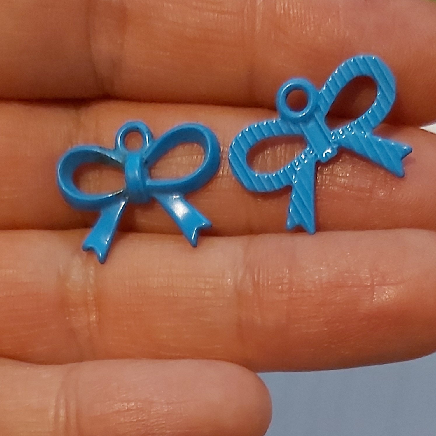 خرجکارفلزی پاپیون رنگی آبی2سانت یک عدد