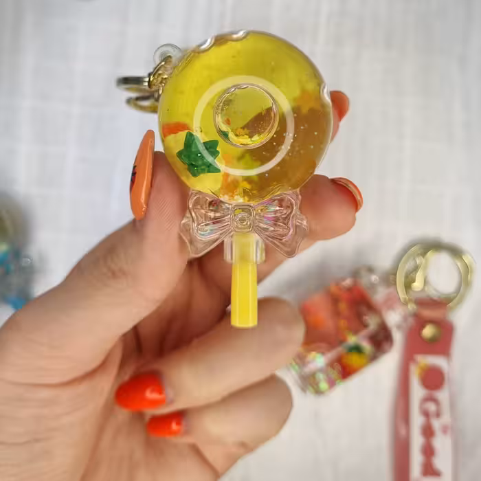 جا سوئیچی جاکلیدی آکواریومی طرح آبنبات آووکادو زرد رنگی رنگی سیلیکونی وارداتی 