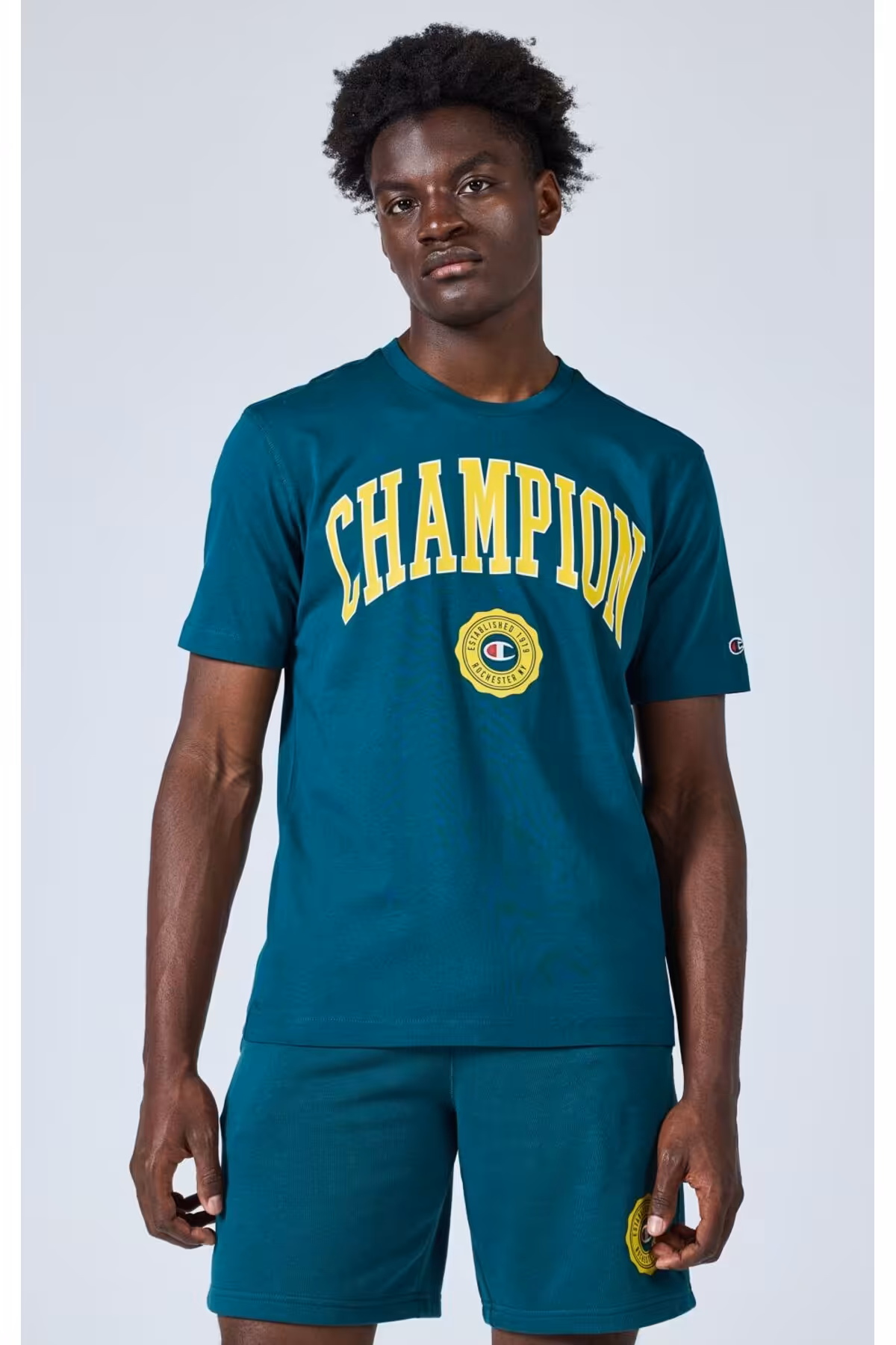 تی شرت آبی مردانه خدمه کتابفروشی اورجینال Champion