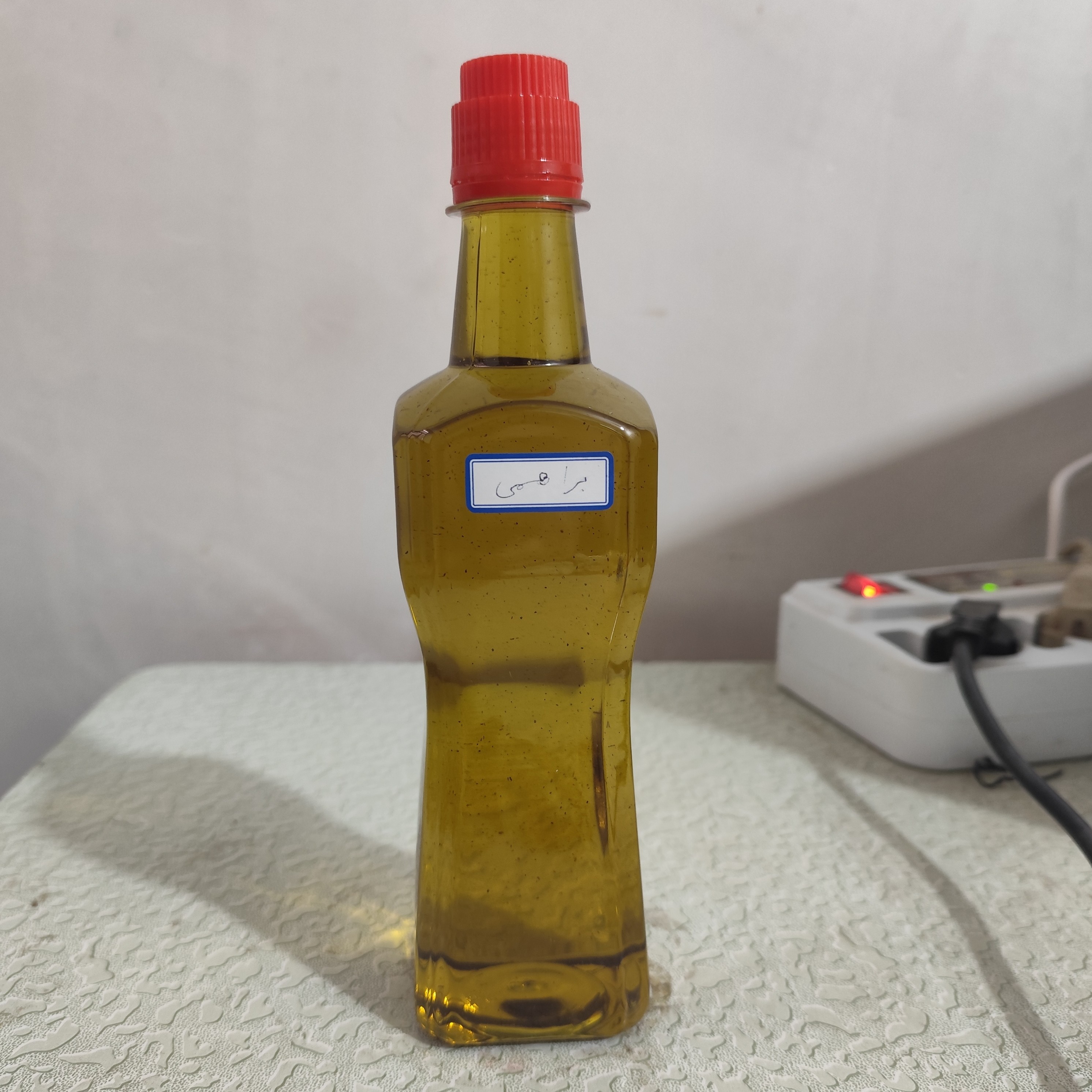 روغن براهمی نیم لیتری اصل (پرپشت کننده مو پرپشت کننده ابرو تقویت مژه تقویت ریش و سبیل)