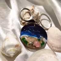 جا کلیدی طرح دریا و ساحل رزینی با صدفهای طبیعی