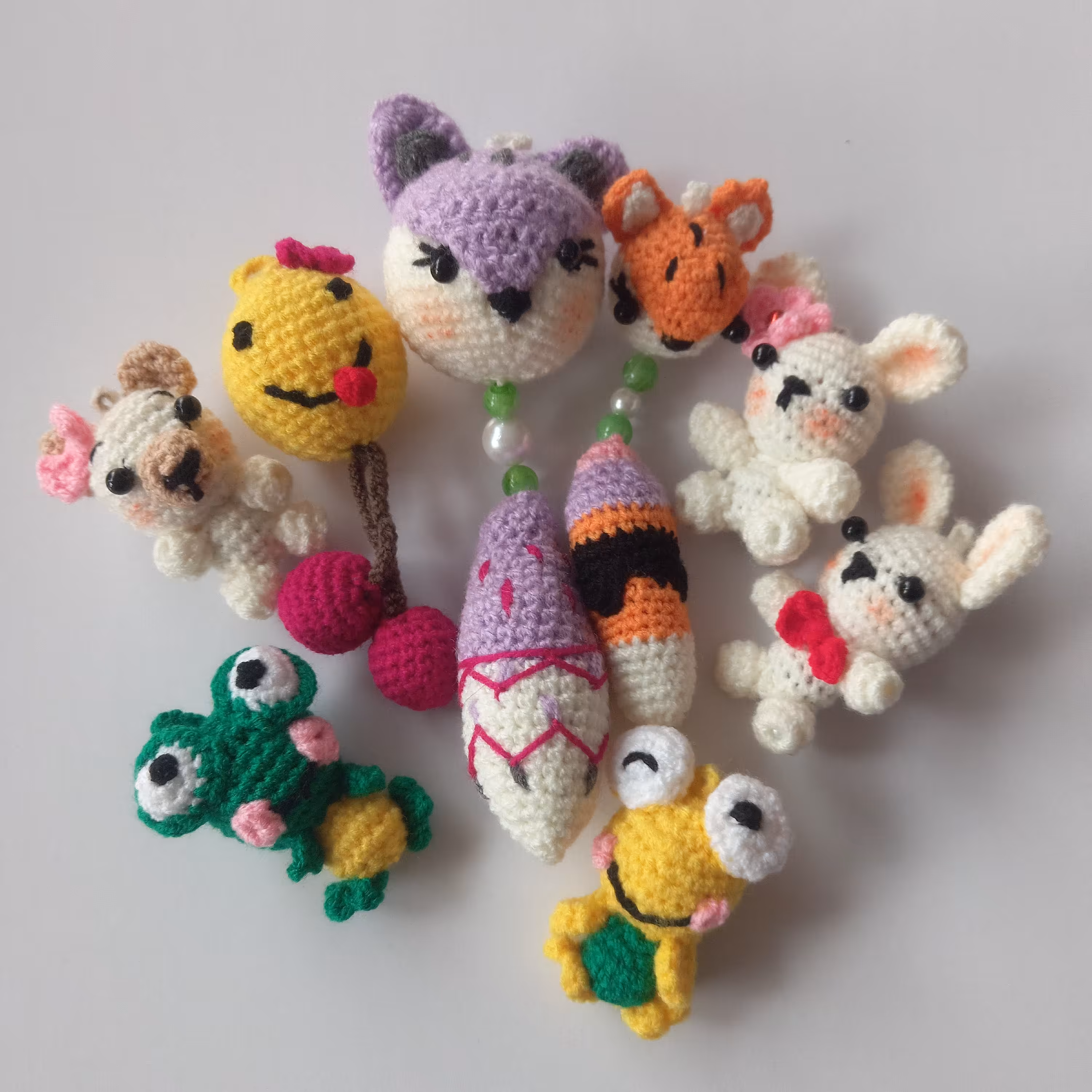 عروسک های بافتنی جاکلیدی و آویز کیف