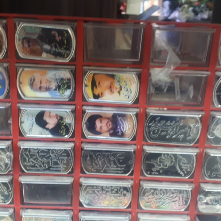 پلاک و زنجیر با عکس شهدا