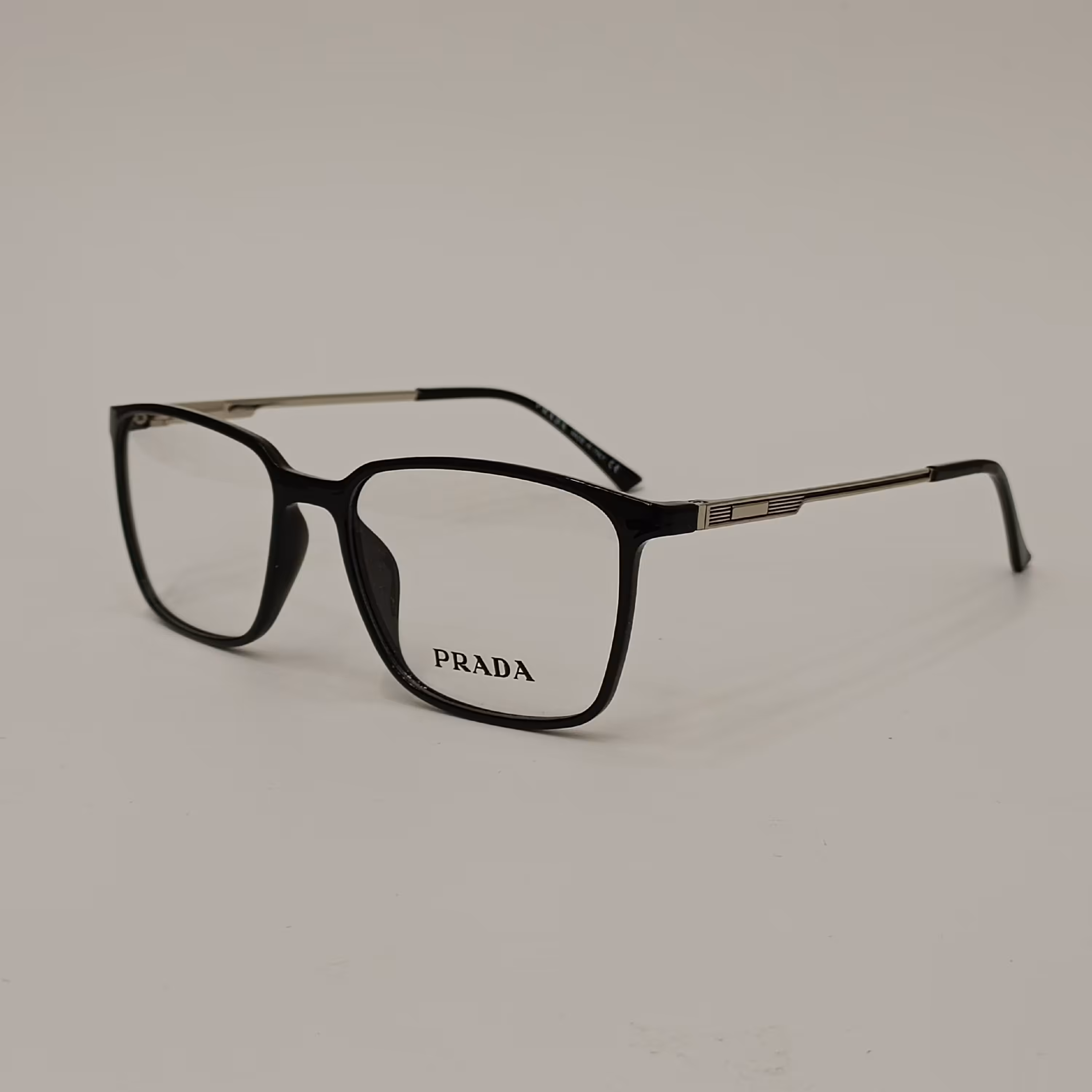 عینک طبی کائوچویی دسته فلزی پرادا