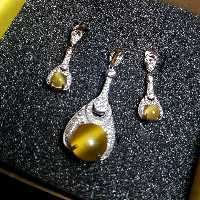 نیم ست سنگ چشم گربه نقره زنانه مدل کیت آبکاری طلا