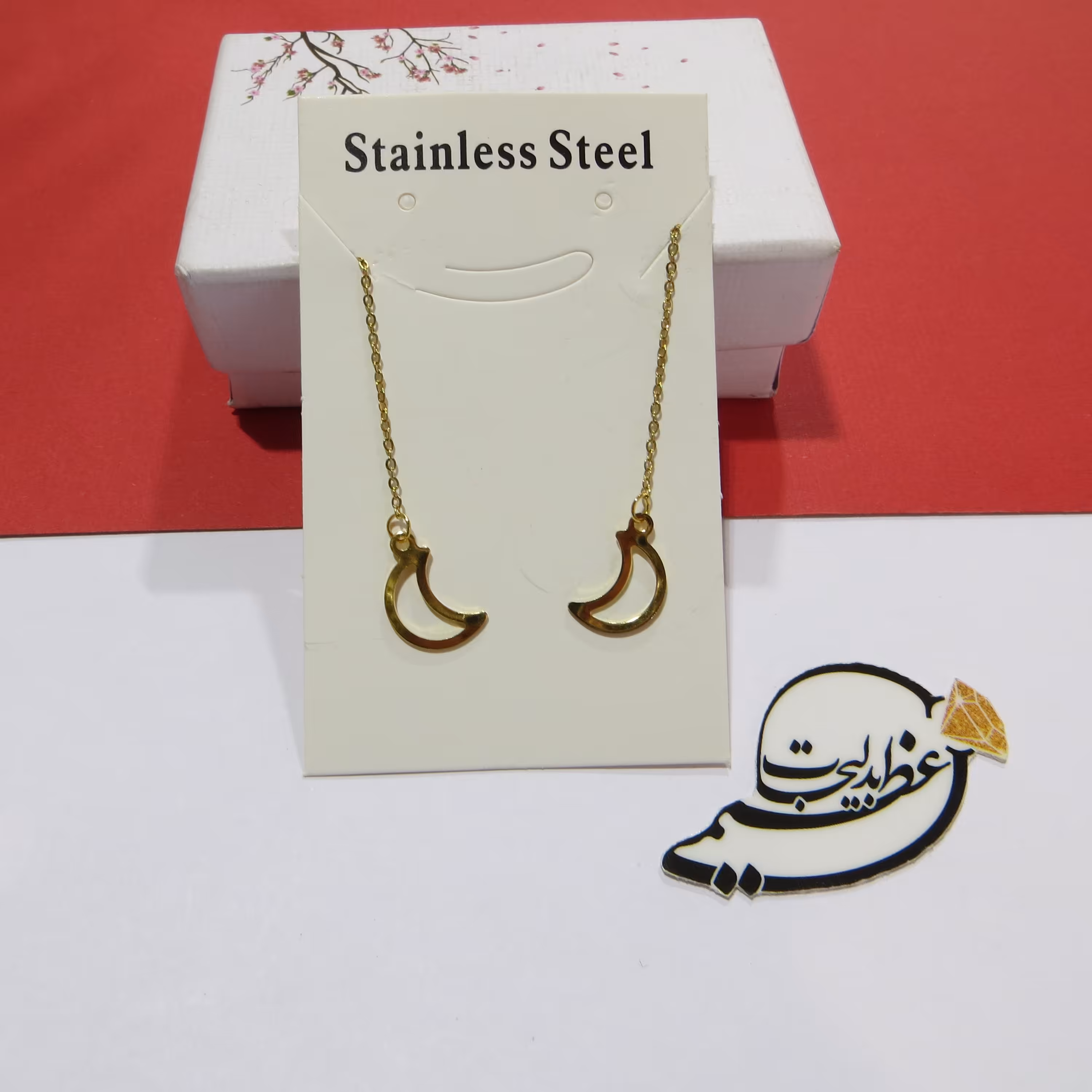 گوشواره بخیه ای استیل رنگ ثابت با کیفیت طرح ماه طلایی