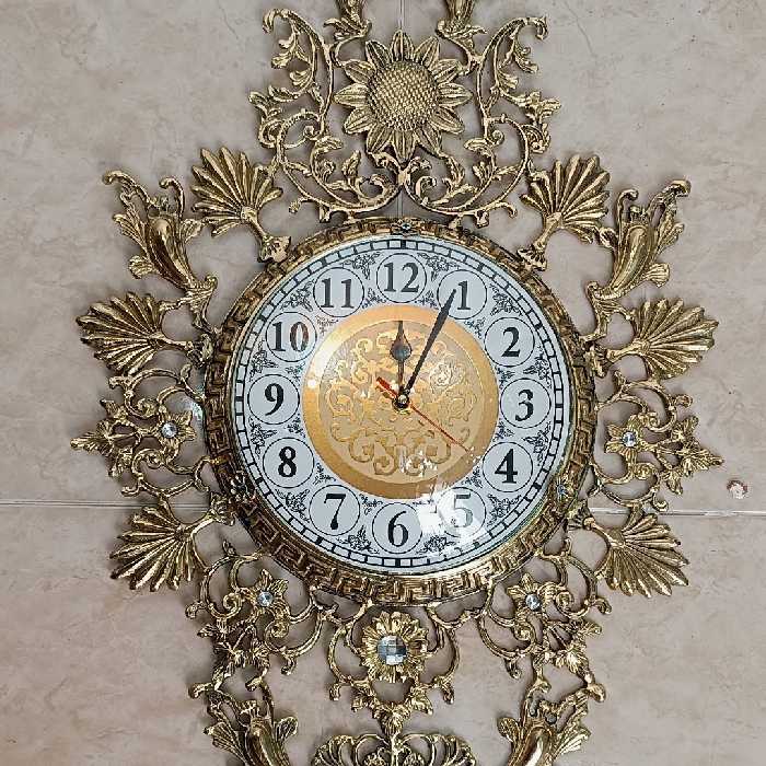 ساعت دیواری برنجی طرح گل آفتابگردان کد 320(ساعت دیواری برنزی)