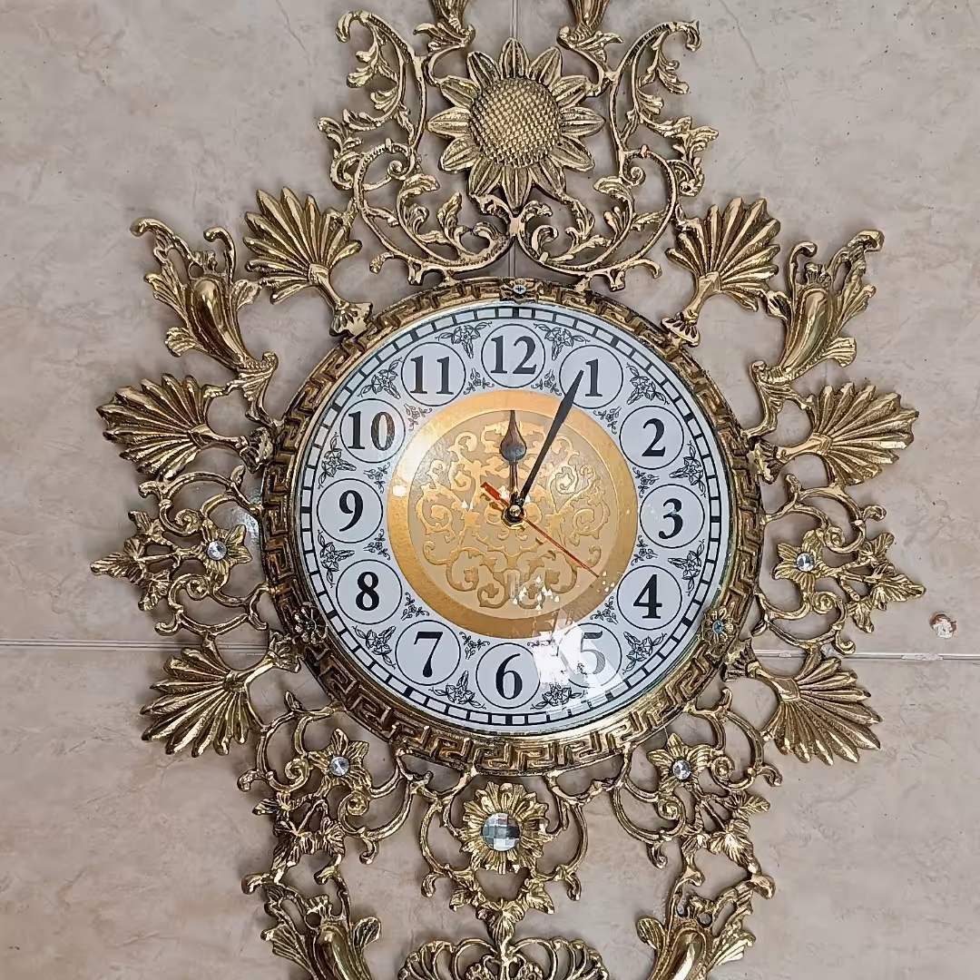 ساعت دیواری برنجی طرح گل آفتابگردان کد 320(ساعت دیواری برنزی)