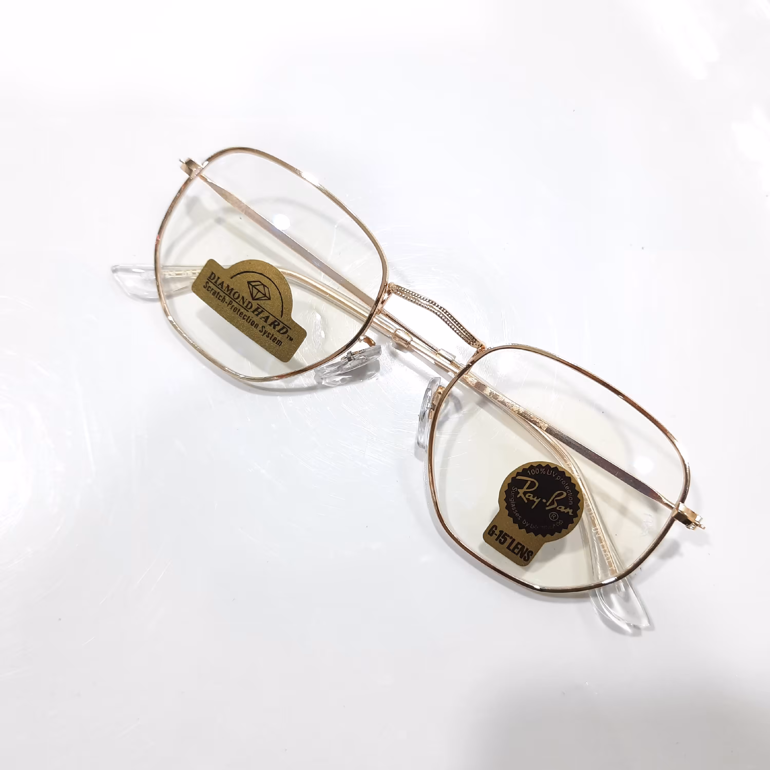 عینک طبی فانتزی rayban ریبن طبی بدنه فلزی رنگ طلایی صورت خور بسیار عالی