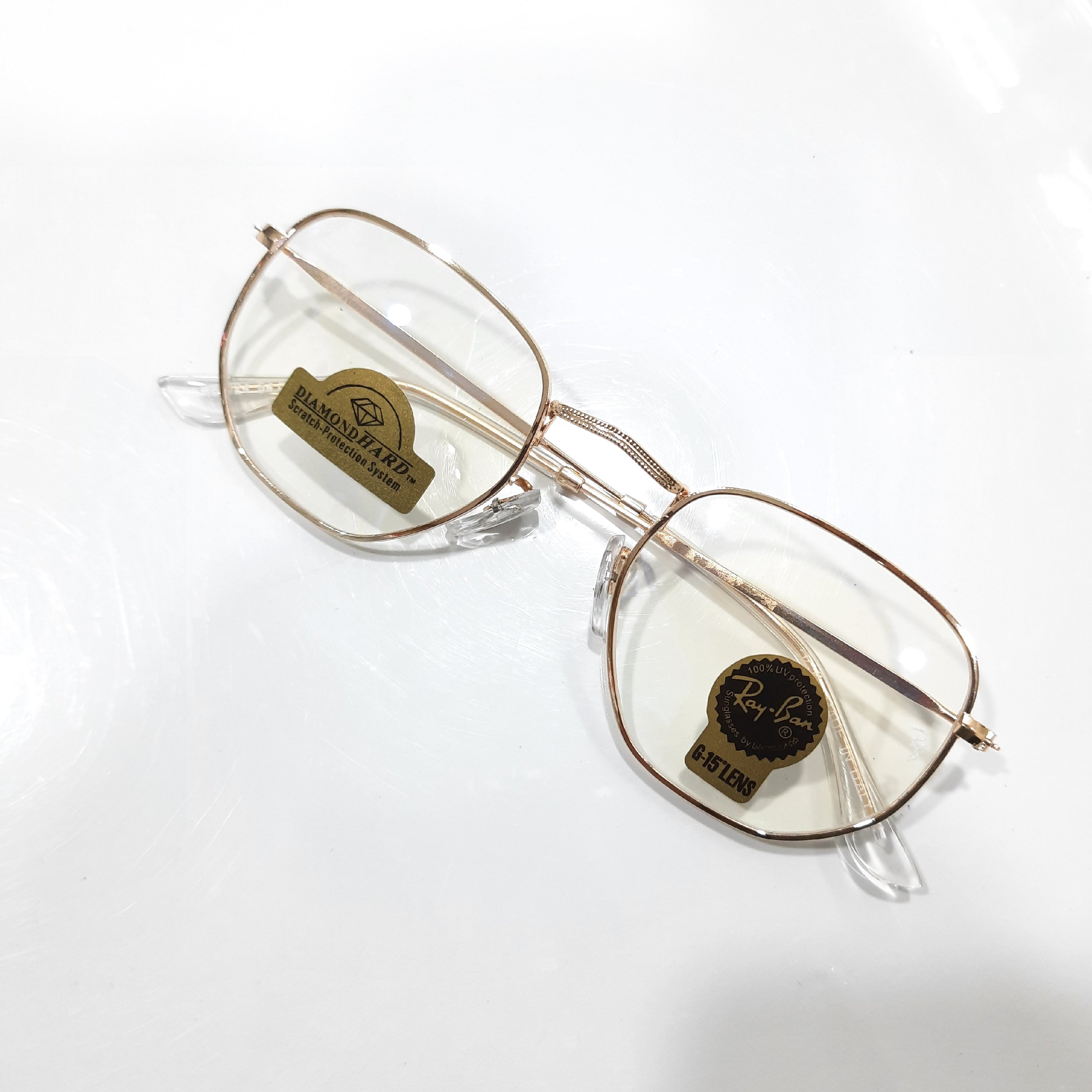 عینک طبی فانتزی rayban ریبن طبی بدنه فلزی رنگ طلایی صورت خور بسیار عالی