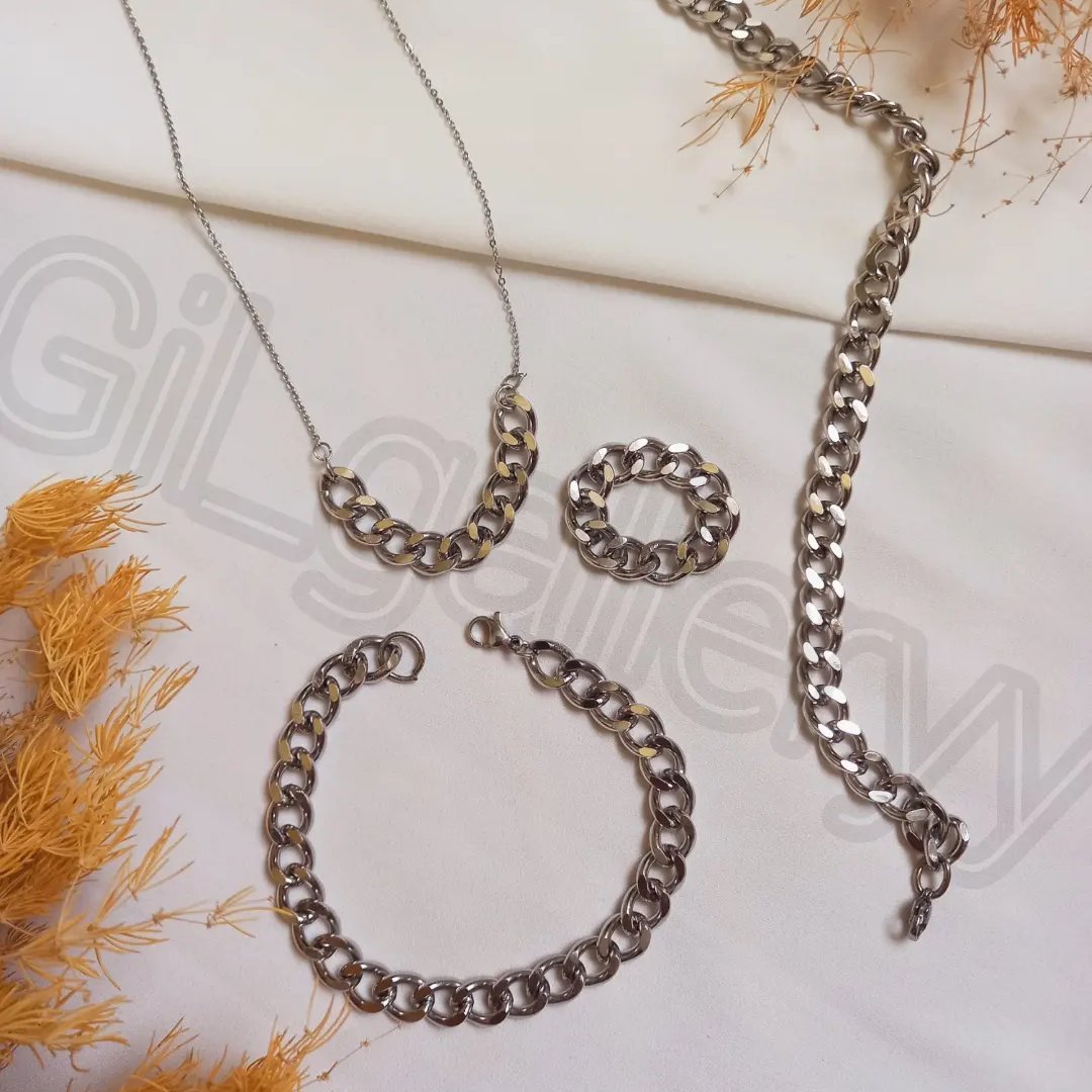 سرویس انگشتر و گردنبند و دستبند کارتیر نقره ای استیل رنگ ثابت