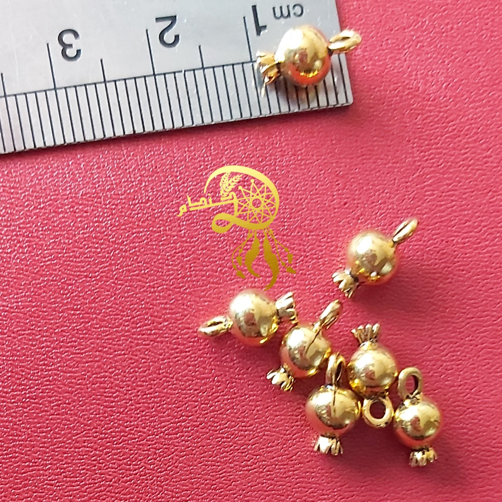 خرجکارانارطلایی کوچک( حدودیک سانت)بسته 5عددی